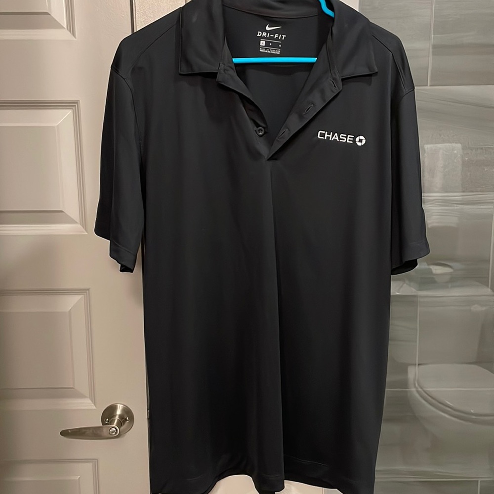 Brand new, never worn, no tags. Nike Dri-fit polo with Chase embroidery